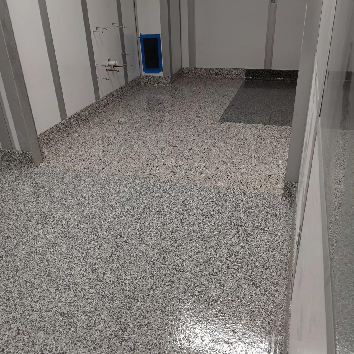 Seamless flake clean room floor with integral cove base and color-coded zones
